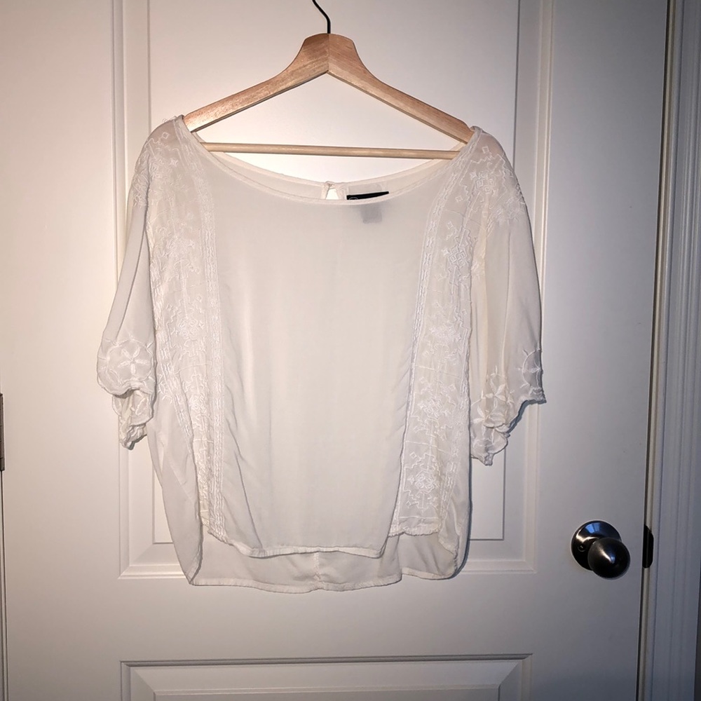 sheer white loose-fitting shirt